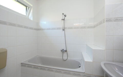 Goliath: Plumbing Fixture, Property, Building, Tap, Bathtub, Bathroom, Shower Head, Shower, Rectangle
