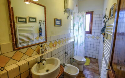 Podere la Torre 56.4: Mirror, Sink, Plumbing Fixture, Tap, Property, Bathroom Sink, Bathroom, Purple, Interior Design, Architecture