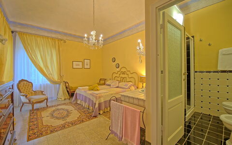 Villa Lorenza: Room, Bed, Property, Furniture, Yellow, Bedroom, Interior Design, Building, Floor, House