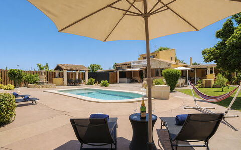 Cas Pec: Outdoor Furniture, Umbrella, Shade, Resort, Furniture, Swimming Pool, Chair, Estate, Landscaping, Hacienda