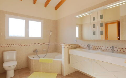 Casa Salvador: Bathroom, Property, Room, Interior Design, Ceiling, Floor, Tile, Yellow, Building, Architecture