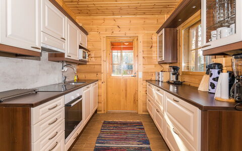 Lokinsiipi: Kitchen, Wood, Countertop, Cabinetry, Major Appliance, Flooring, Kitchen Appliance, Interior Design, Ceiling, Home
