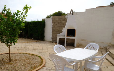 Villa Palma: Table, Furniture, Tableware, Property, Sky, Chair, Textile, Interior Design, Wood, Tree