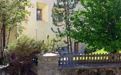 Chesa Frizzoni: Plant, Building, Property, Window, Branch, Road Surface, Tree, Yellow, Vegetation, Land Lot