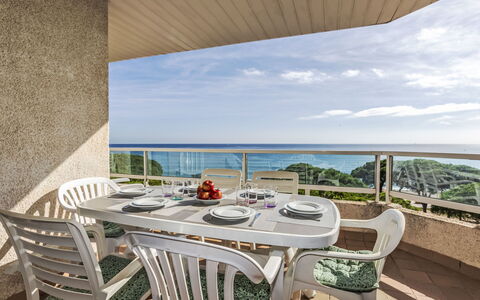 Blanes Beach: Table, Daytime, Property, Sky, Furniture, Cloud, Water, Chair, Shade, Wood