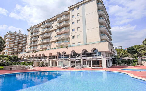 Blanes Beach: Cloud, Water, Building, Sky, Plant, Property, Swimming Pool, Window, Azure, Tree