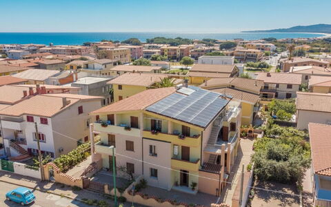 La Caletta 120: Building, Residential Area, Town, City, Neighbourhood, Home, Urban Area, Apartment, Facade, Architecture