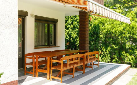 Picea: Plant, Building, Shade, Wood, Tree, Interior Design, Architecture, Outdoor Furniture, Cottage, Table