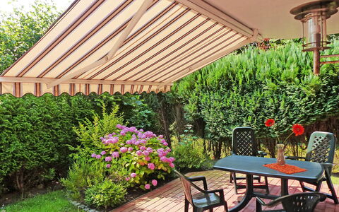Norddeich 764: Backyard, Property, Garden, Yard, Patio, Real Estate, Pergola, Tree, Plant, Landscaping