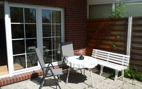 Norddeich 716: Furniture, Property, Plant, Window, Building, Shade, Wood, Chair, Outdoor Furniture, Brick