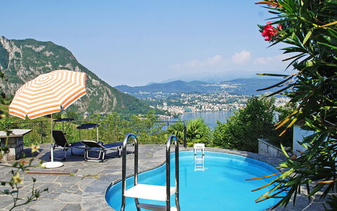 Ursula: Water, Sky, Property, Mountain, Plant, Swimming Pool, Cloud, Azure, Body Of Water, Outdoor Furniture