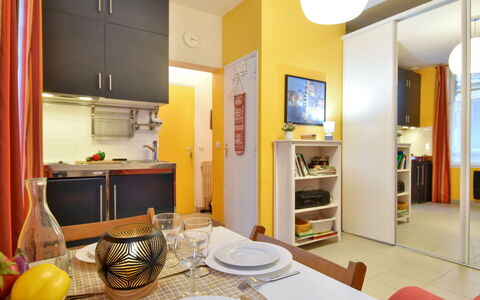 Bonsecours: Table, Property, Furniture, Picture Frame, Television, Lighting, Interior Design, Tableware, Chair, Home Appliance