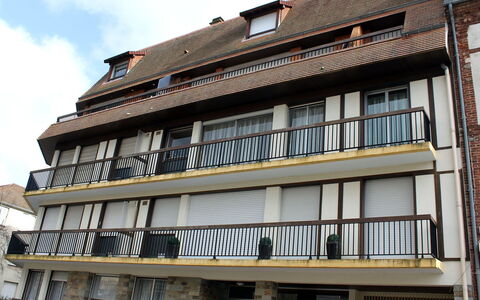 Les Cigognes: Sky, Building, Property, Cloud, Window, Urban Design, Wood, House, Condominium, City