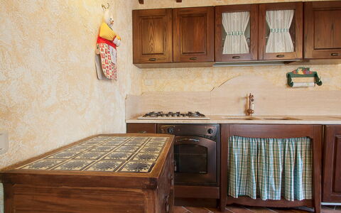 Poggiolo: Countertop, Cabinetry, Kitchen, Wood, Interior Design, Drawer, Flooring, Floor, Kitchen Appliance, Wood Stain