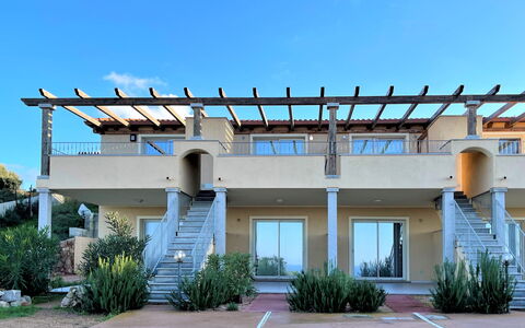 Le Verande Bilo: Plant, Sky, Window, Shade, Building, Urban Design, Residential Area, Neighbourhood, Public Space, Facade