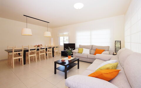 Sant Mori: Table, Furniture, Couch, Comfort, Building, Orange, Studio Couch, Houseplant, Lighting, Interior Design