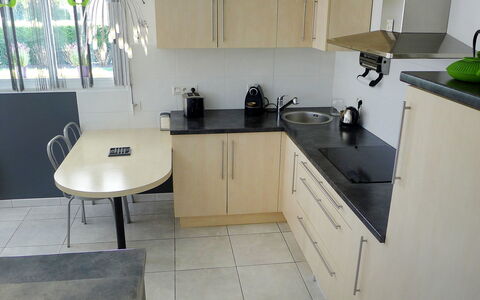 Sainte Marie: Tap, Kitchen Sink, Countertop, Sink, Cabinetry, Plant, Plumbing Fixture, Kitchen, Kitchen Stove, Wood