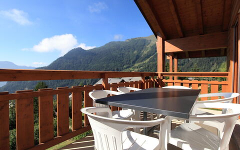 Ovronnaz 505: Sky, Cloud, Property, Building, Table, Wood, Porch, Shade, Tree, House