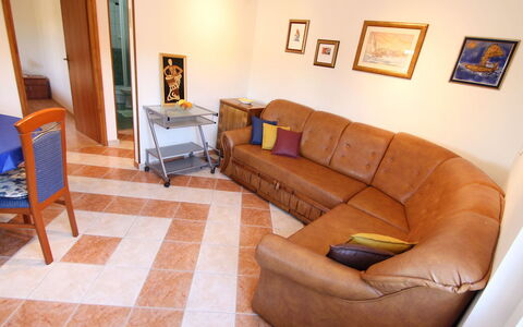 Ratimir: Picture Frame, Furniture, Couch, Comfort, Orange, Living Room, Wood, Studio Couch, Table, Flooring