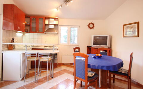 Ratimir: Furniture, Table, Cabinetry, Picture Frame, Chair, Wood, Countertop, Orange, Architecture, Kitchen Appliance