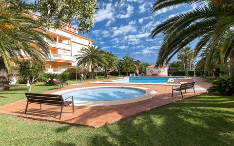 La Marina: Water, Plant, Sky, Building, Cloud, Swimming Pool, Azure, Tree, Outdoor Furniture, Shade