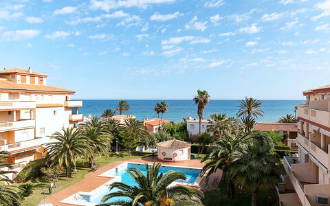 La Marina: Sky, Building, Water, Cloud, Window, Azure, Tree, Plant, Arecales, Seaside Resort