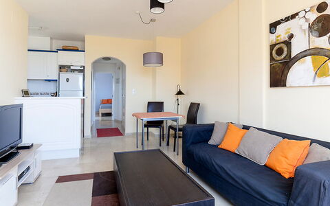 La Marina: Furniture, Property, Couch, Table, Picture Frame, Comfort, Wood, Television, Lighting, Architecture
