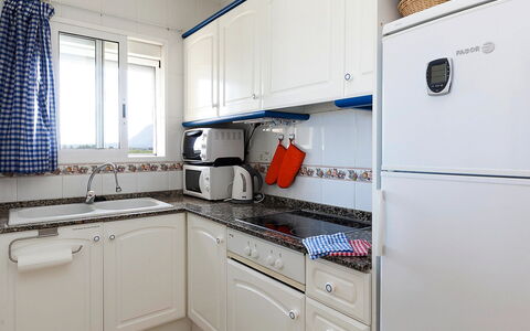 La Marina: Cabinetry, Property, Kitchen Sink, Furniture, Blue, Kitchen Appliance, Kitchen Stove, Kitchen, Window, Countertop
