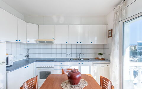 Empuriabrava 515: Furniture, Cabinetry, Property, Countertop, Table, Tap, Interior Design, Wood, Tableware, Lighting