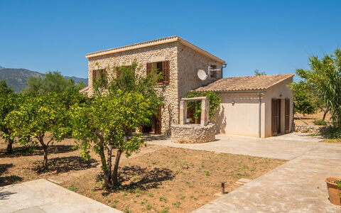 Cas Ciutada: Building, Facade, House, Residential Area, Home, Architecture, Shrub, Landscape, Door