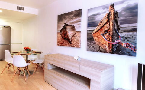 Escorxador: Table, Furniture, Comfort, Wood, Interior Design, Building, Orange, Living Room, Wall, Rectangle