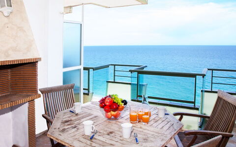 Playa de Aro 230: Table, Sky, Furniture, Property, Water, Building, Flower, Azure, Blue, Chair