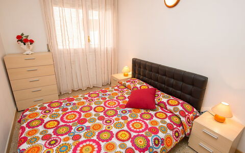 Rambla de Tossa: Furniture, Property, Window, Building, Comfort, Textile, Orange, Interior Design, Lighting, Bed Frame