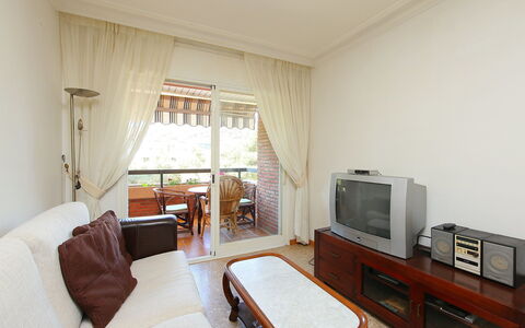 Rambla de Tossa: Furniture, Comfort, Television, Table, Wood, Interior Design, Curtain, Living Room, Flooring, Floor