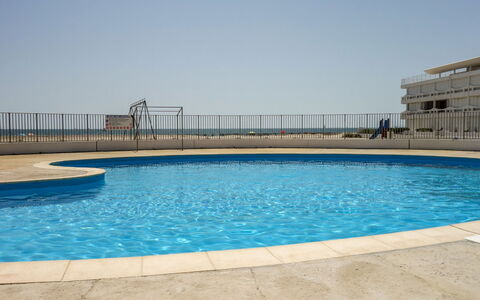La Résidence de la Mer: Water, Sky, Blue, Swimming Pool, Rectangle, House, Outdoor Furniture, Building, Shade, Aqua