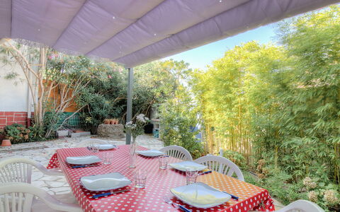 Villa Thiers: Table, Plant, Furniture, Property, Chair, Tableware, Shade, Outdoor Furniture, Tree, Interior Design