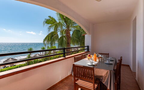 Casa Vecchi: Table, Property, Furniture, Water, Plant, Sky, Building, Wood, Chair, Architecture