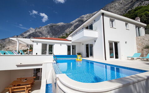 Prestige: Water, Sky, Cloud, Building, Property, Mountain, Furniture, White, Blue, Azure