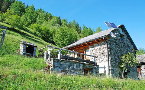 Rustico Pamela: Plant, Sky, Natural Landscape, Tree, Land Lot, Building, Slope, Wood, Cottage, Grassland