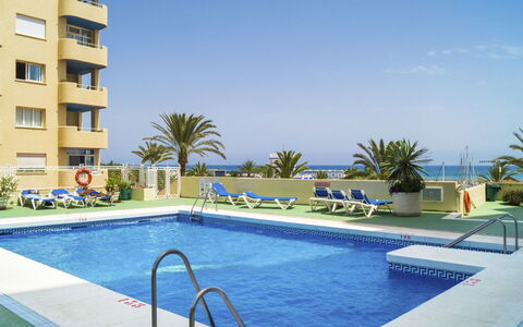 Puerto Paraíso: Swimming Pool, Property, Building, Resort, Apartment, Real Estate, Vacation, Condominium, House, Town