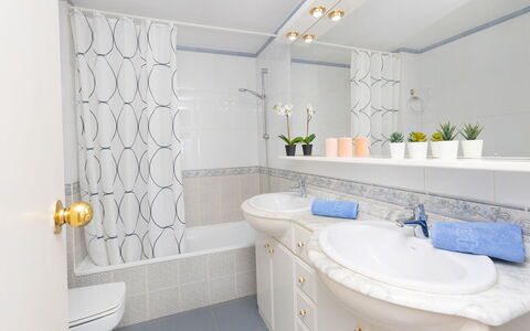 Front Beach: Mirror, Plumbing Fixture, Tap, Property, Bathroom Sink, Sink, Bathroom, Purple, Lighting, Architecture
