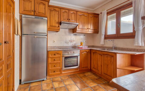 El Arenal: Cabinetry, Countertop, Furniture, Building, Kitchen, Drawer, Kitchen Appliance, Kitchen Stove, Wood, Home Appliance