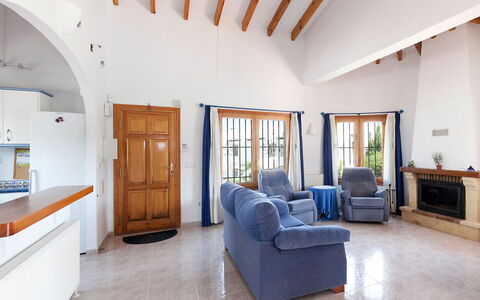Villa Jilian: Furniture, Property, Azure, Wood, Cabinetry, Door, Building, Comfort, Interior Design, Hall