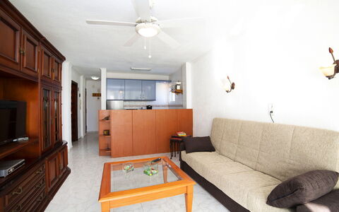 Calpe Calp 342: Furniture, Property, Table, Couch, Ceiling Fan, Building, Cabinetry, Wood, Interior Design, Living Room