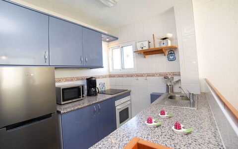Calpe Calp 342: Countertop, Cabinetry, Property, Furniture, Sink, Tap, Kitchen Stove, Kitchen, Wood, Interior Design