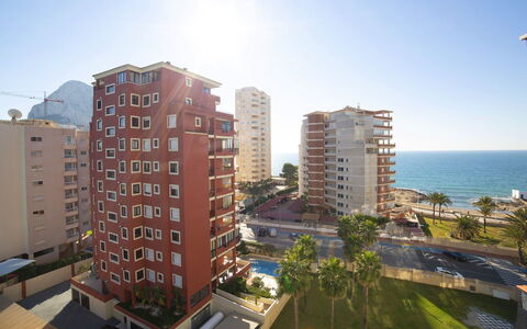 Calpe Calp 342: Sky, Building, Plant, Daytime, Property, Skyscraper, Water, Light, Window, Infrastructure