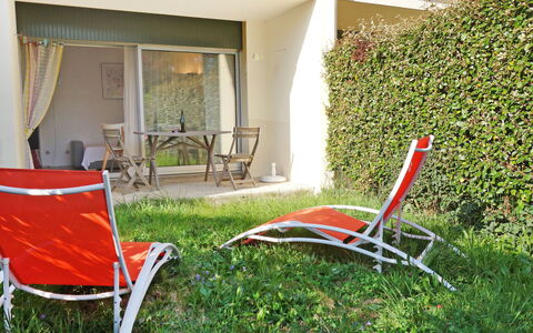 Plein Soleil: Plant, Property, Furniture, Outdoor Furniture, Shade, Curtain, Leisure, Grass, Chair, Lawn