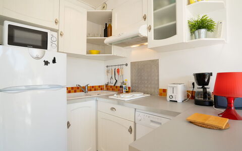 Port Camargue 145: Cabinetry, Furniture, Countertop, Kitchen Stove, Kitchen Appliance, Kitchen, Building, Sink, Plant, Kitchen Sink