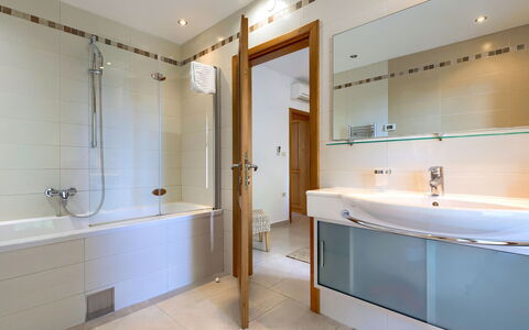 Remington: Plumbing Fixture, Property, Building, Tap, Shower Head, Bathroom, Shower, Door, Shower Door