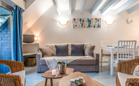 Les Pins: Table, Furniture, Couch, Property, Blue, Chair, Living Room, Interior Design, Lighting, Floor